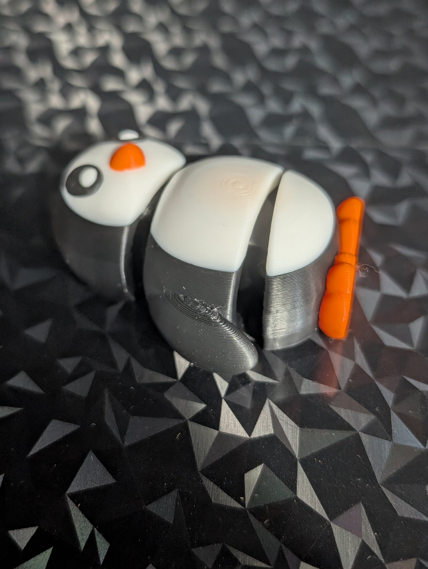 3D printed articulated Penguin bag tag