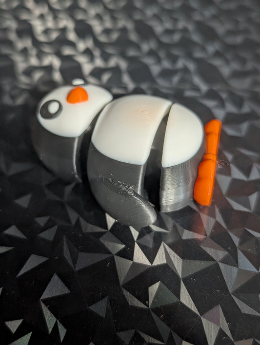 3D printed articulated Penguin bag tag