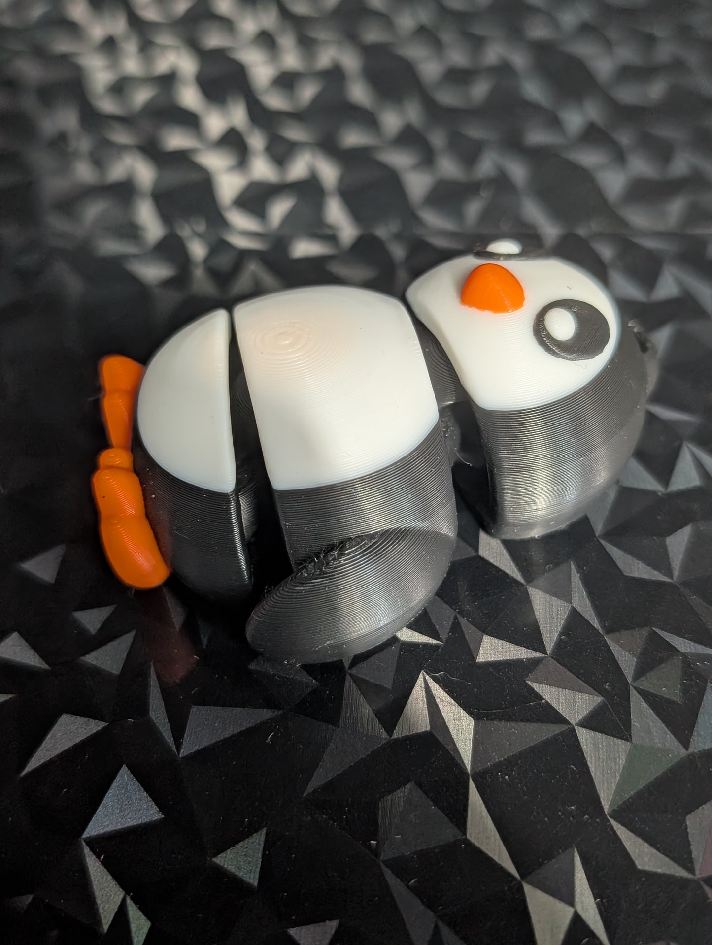 3D printed articulated Penguin bag tag