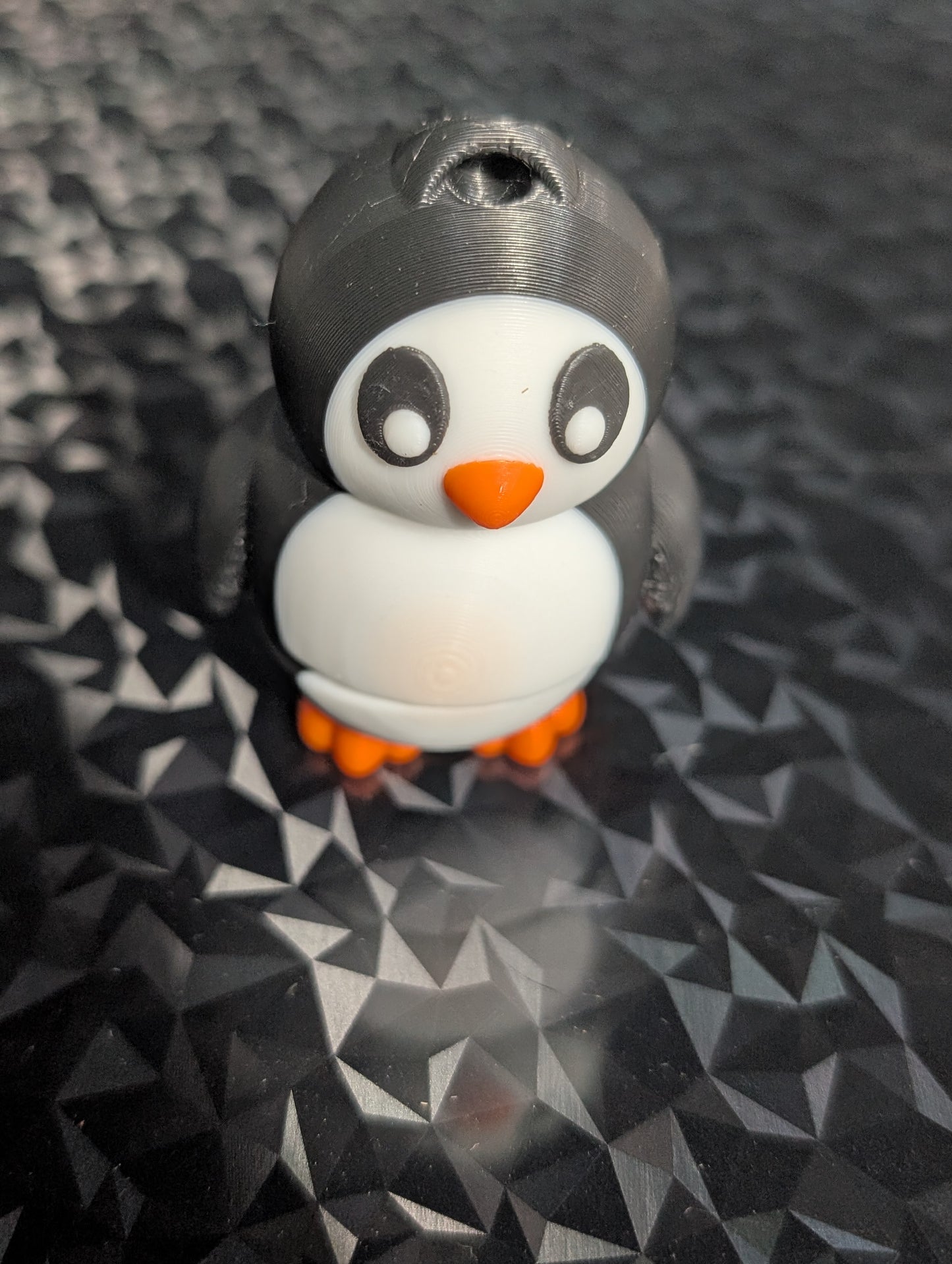3D printed articulated Penguin bag tag